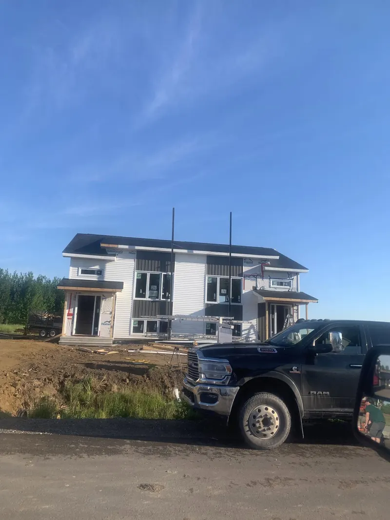 The CG Drywall truck parked at a new build in southeast New Brunswick